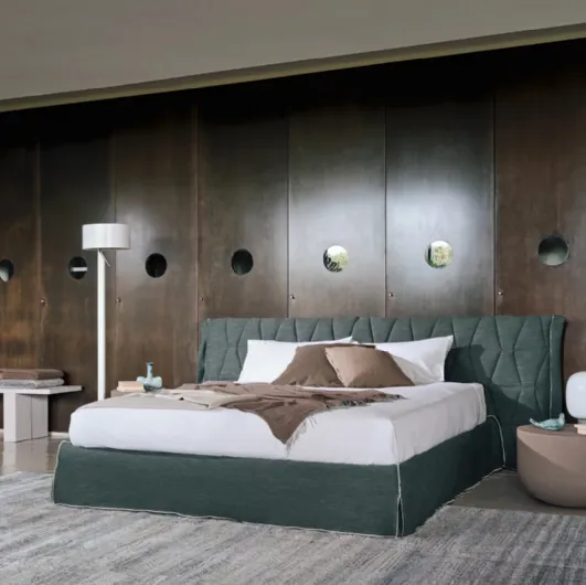 Bed with Gem headboard by Gervasoni.