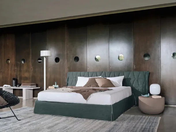 Bed with Gem headboard by Gervasoni.