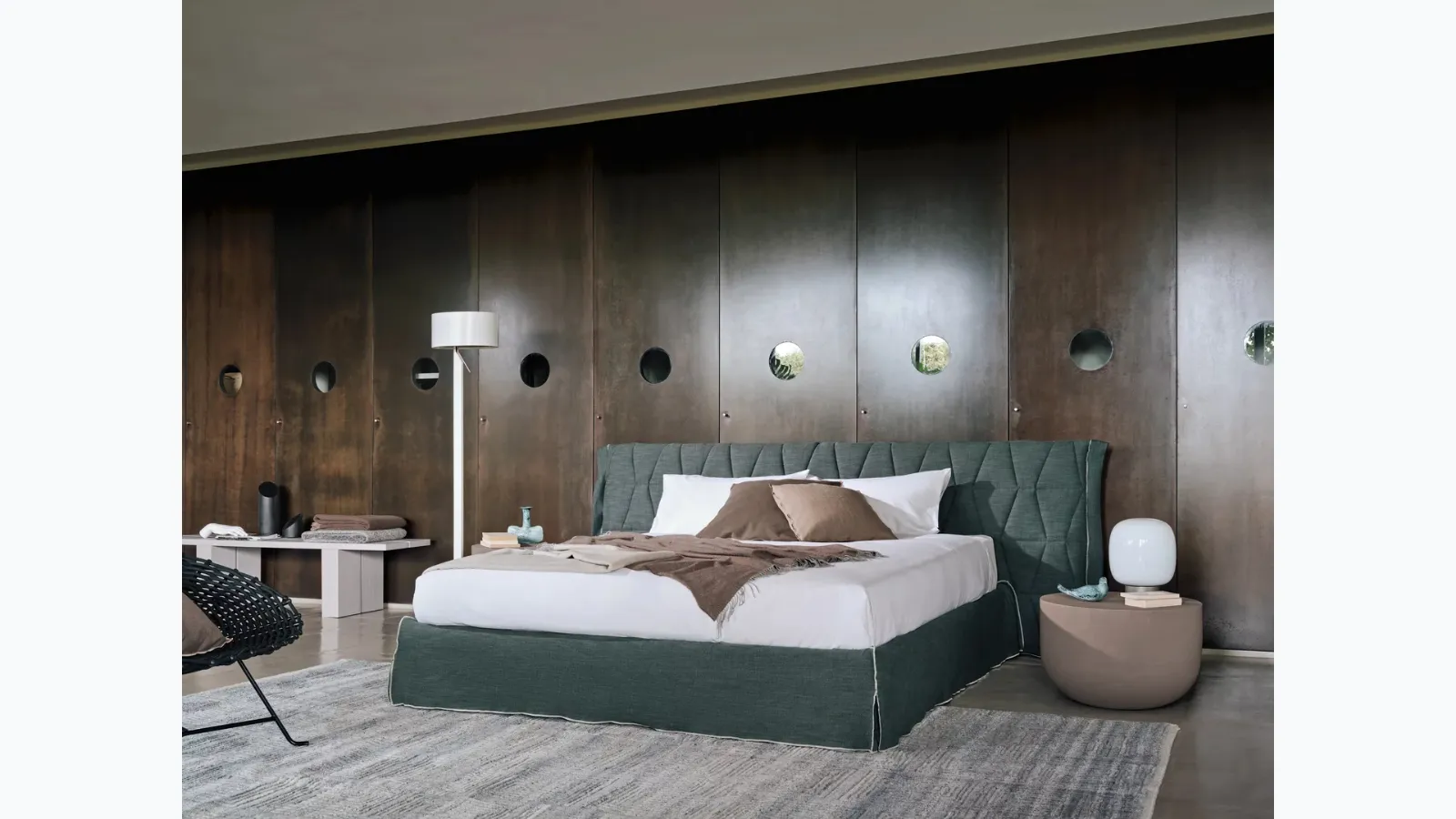 Bed with Gem headboard by Gervasoni.