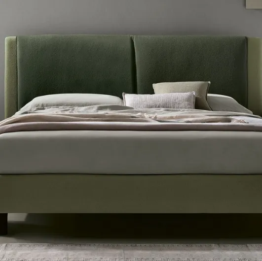 Tomasella's upholstered fabric Gemini bed