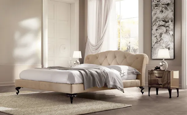 Bed with padded and quilted headboard George by Cantori.