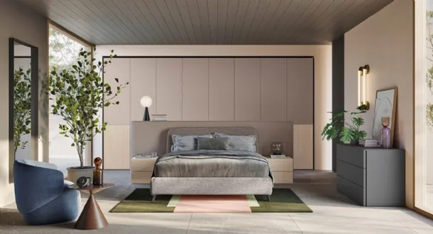 Fabric bed with Golf Verso headboard by Colombini Casa.