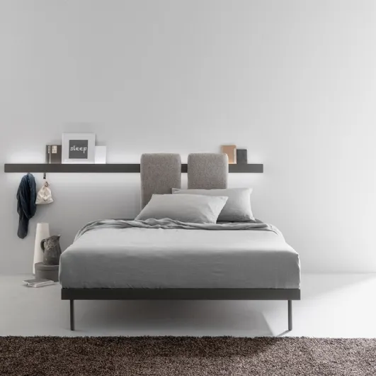 Metal bed with sliding, padded and removable panels to be hooked onto the bar fixed to the Groove Run wall by Caccaro.