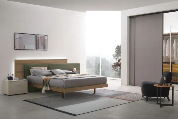 Halifax bed in amber walnut material with padded headboard by Tomasella.