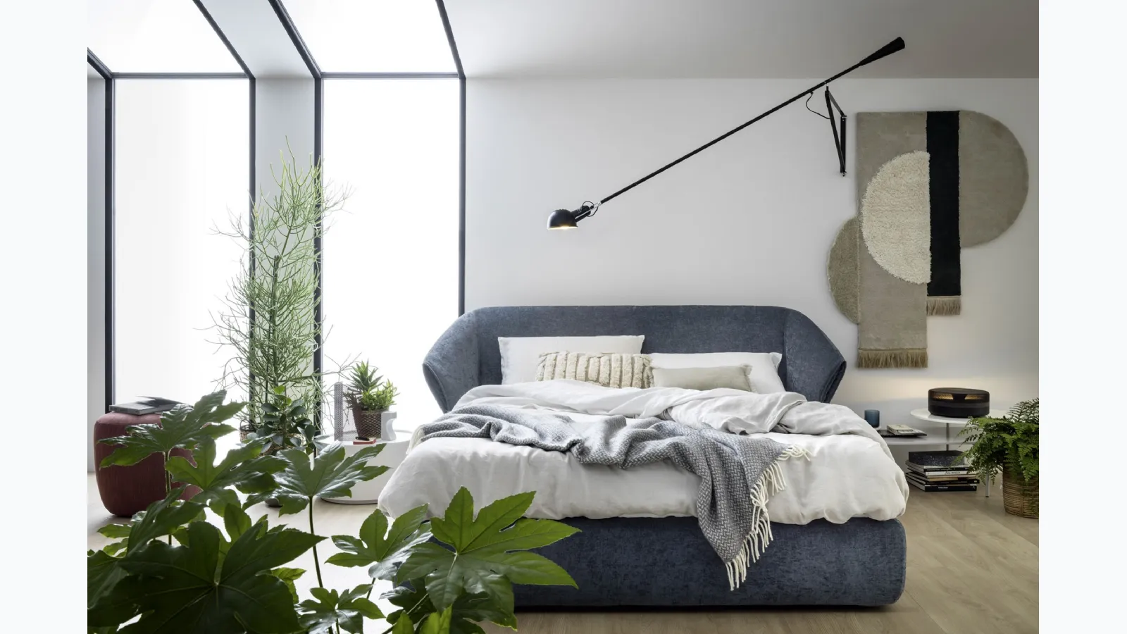 Hide bed with storage box by Novamobili