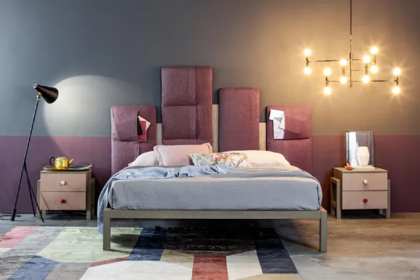 Indio bed with padded headboard by Callesella.