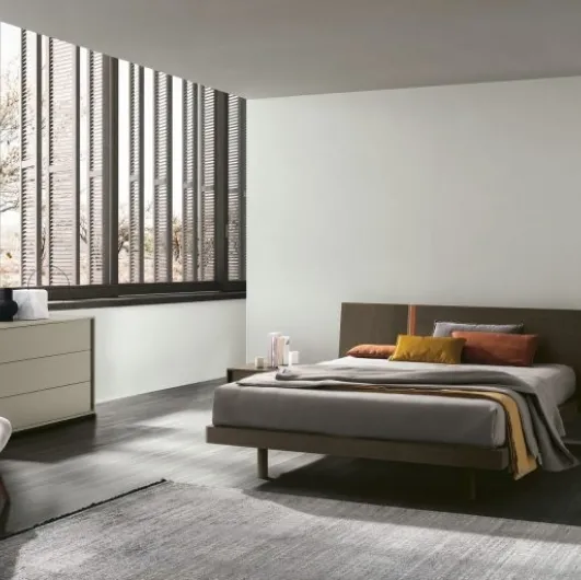 Bed with Ken headboard in textured moka oak by Tomasella.