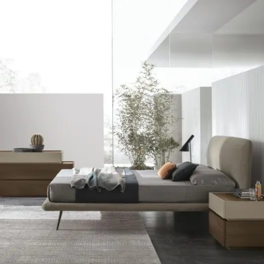 Double bed with Luna headboard by Tomasella.