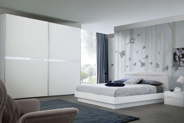 Bed with fabric headboard in Oasi Bouclè S75.