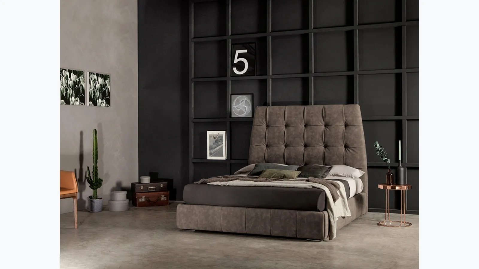 Leather bed with important quilted headboard Pacific by Tonin Casa.