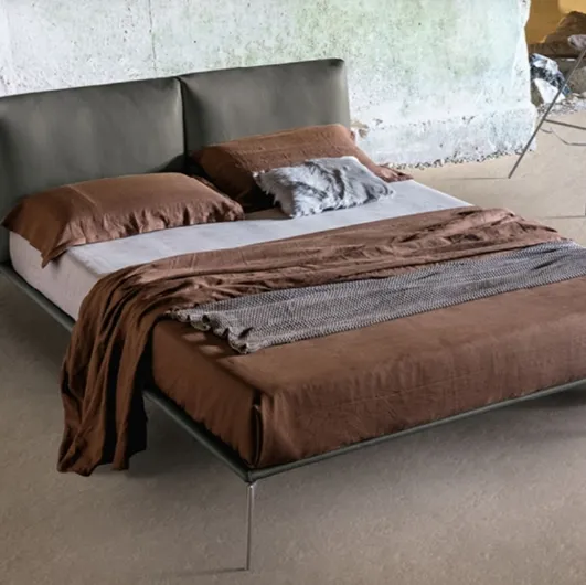 Papillon upholstered leather headboard bed by Alivar.