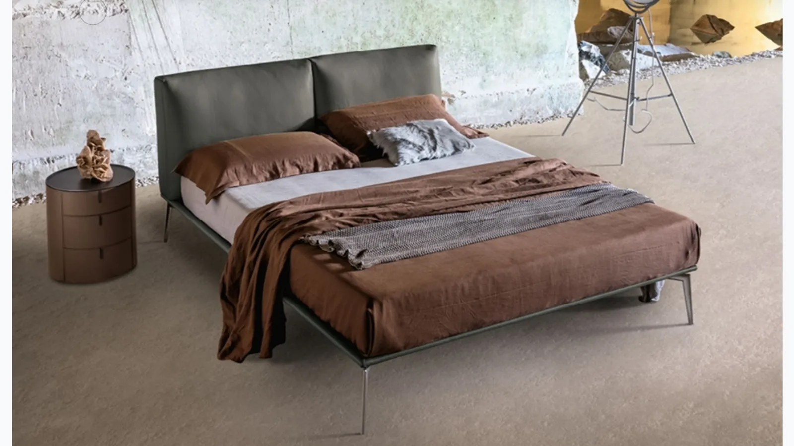 Papillon upholstered leather headboard bed by Alivar.