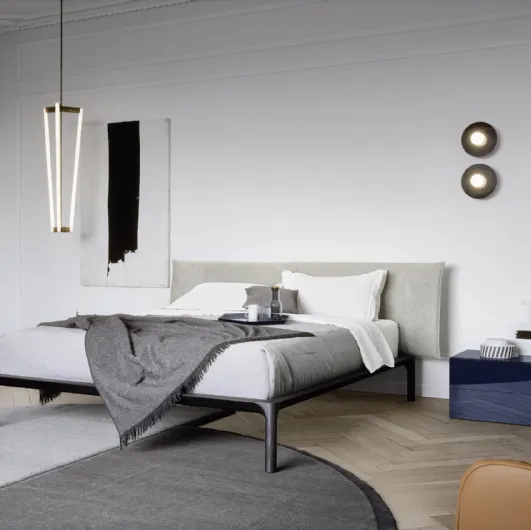 Bed with fabric headboard and wooden frame Park by Novamobili.
