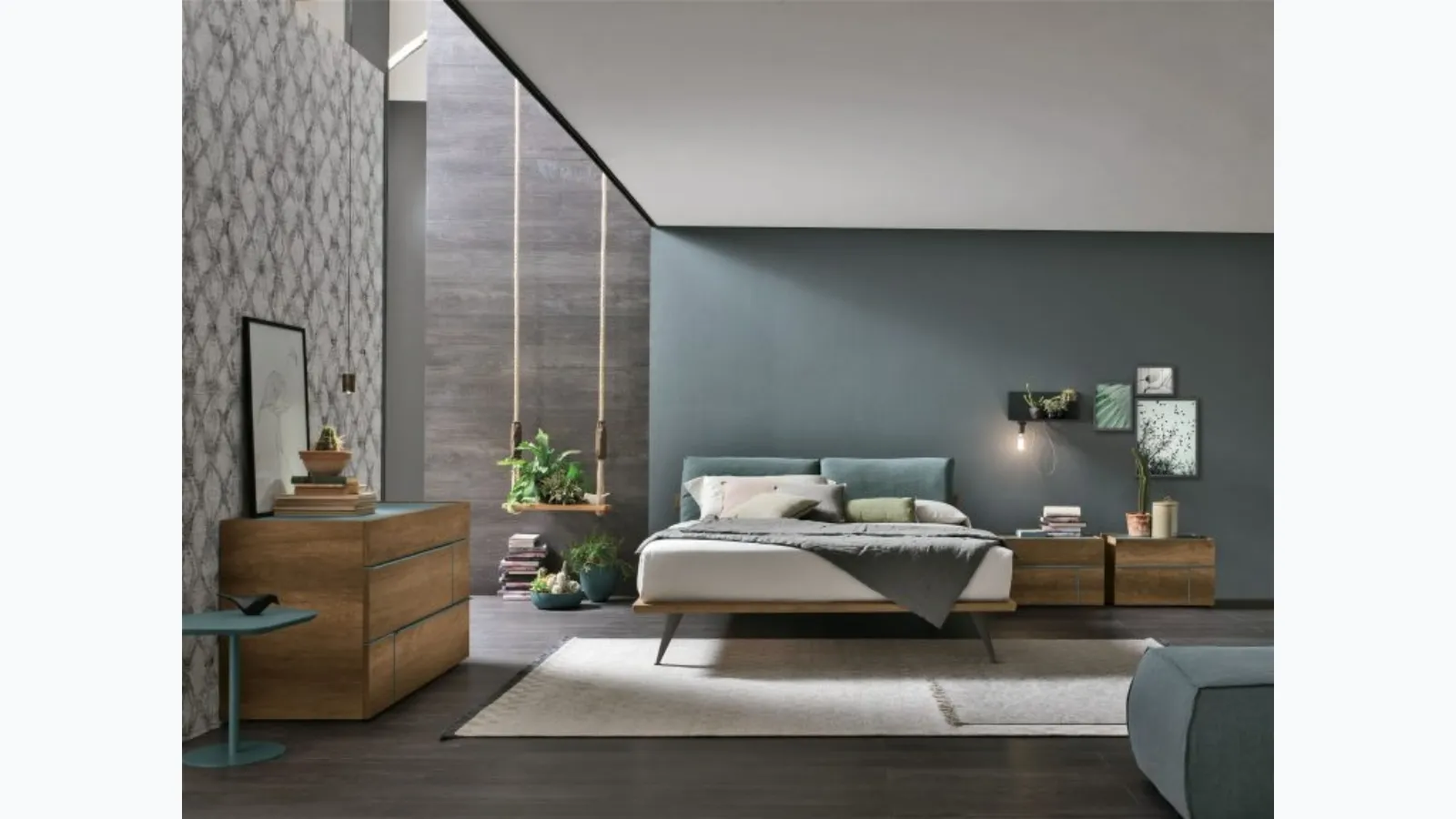 Feather bed with padded fabric headboard by Tomasella.