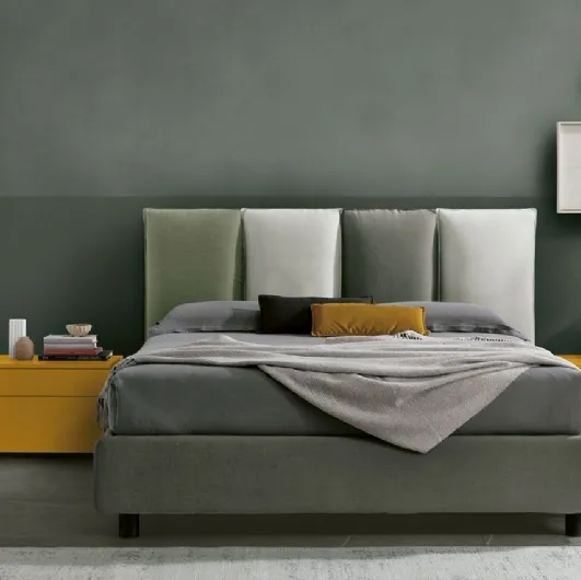Poker padded fabric bed by Tomasella.