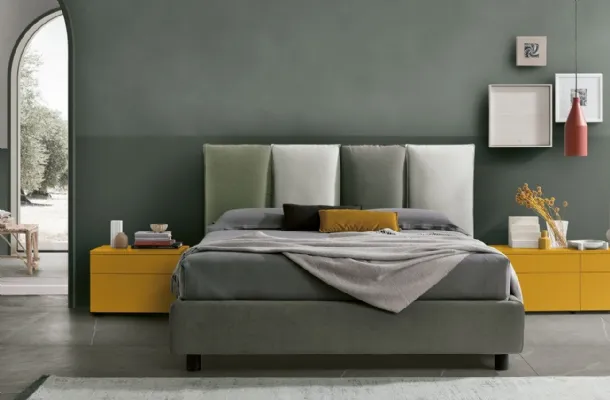 Poker padded fabric bed by Tomasella.