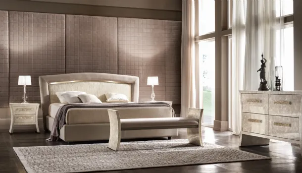 Classic bed with upholstered headboard with Portofino gold details by Cantori