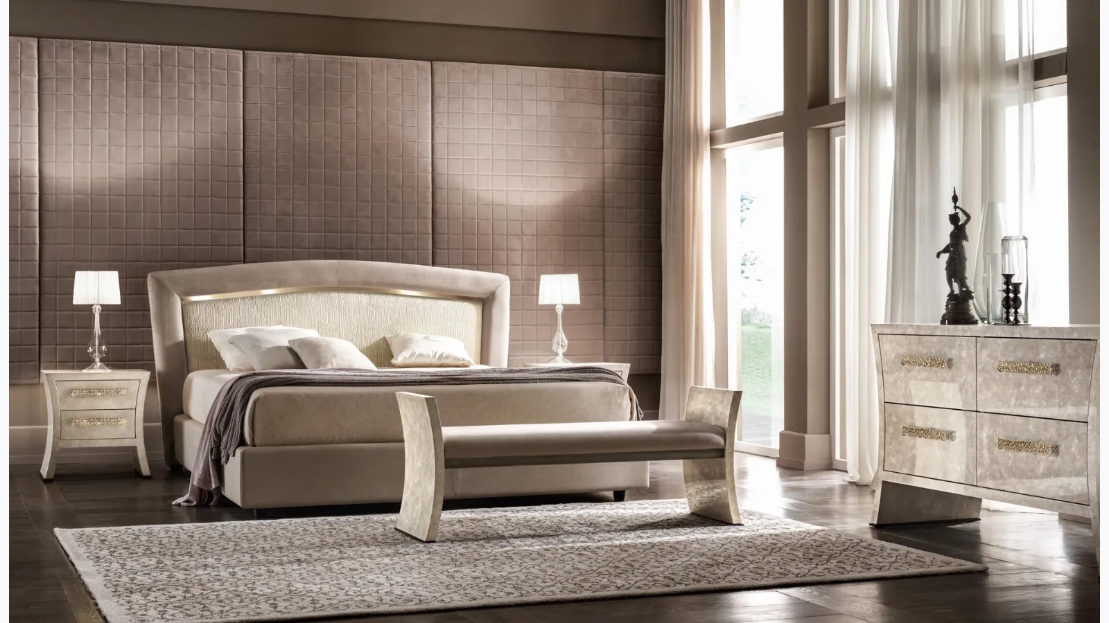 Classic bed with upholstered headboard with Portofino gold details by Cantori