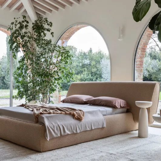 Scultured upholstered double bed Rio by Mogg.