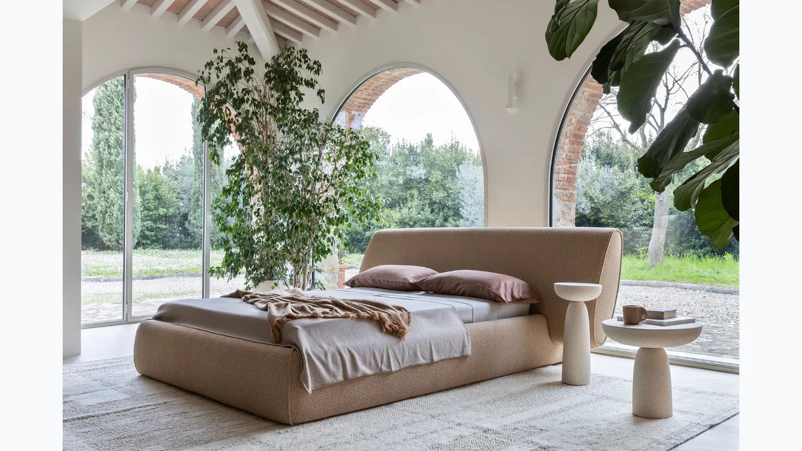 Scultured upholstered double bed Rio by Mogg.