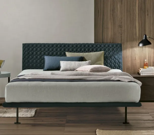 Seven Plus bed with padded headboard by Tomasella