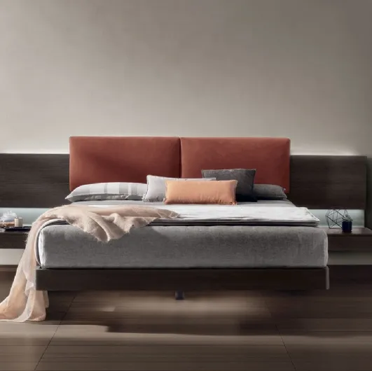Bed in moka oak material with padded leather headboard Shiro by Tomasella.