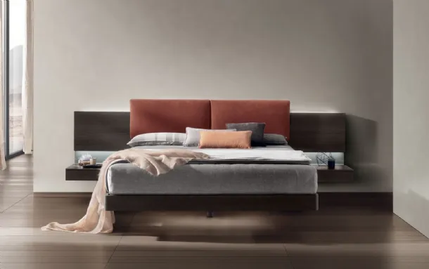 Bed in moka oak material with padded leather headboard Shiro by Tomasella.