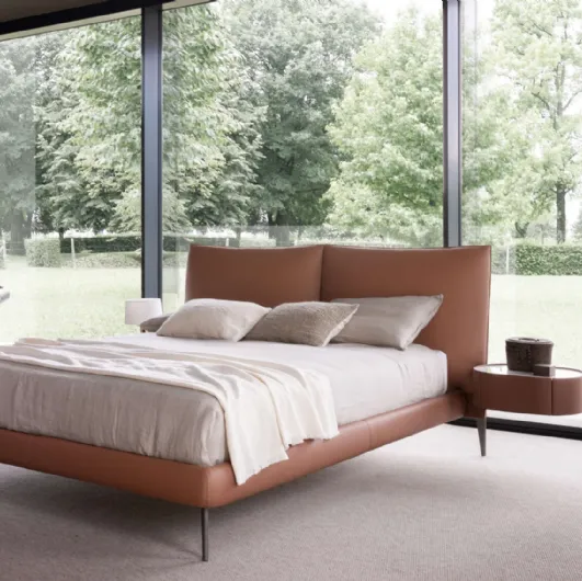Leather bed Siena with Presotto headboard.