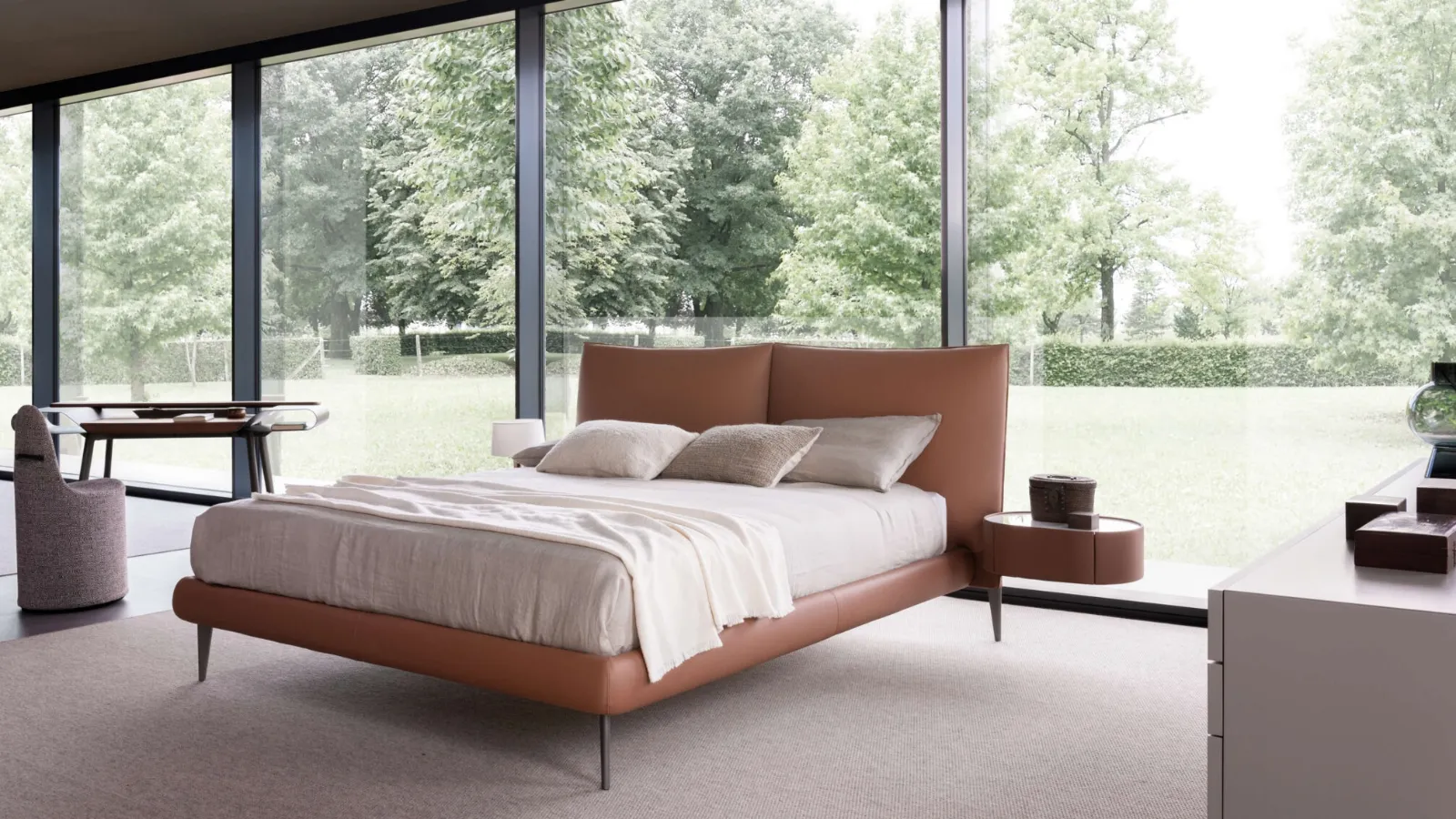 Leather bed Siena with Presotto headboard.