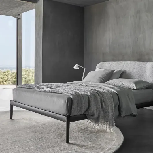 Sissi bed with upholstered fabric headboard by Sangiacomo.