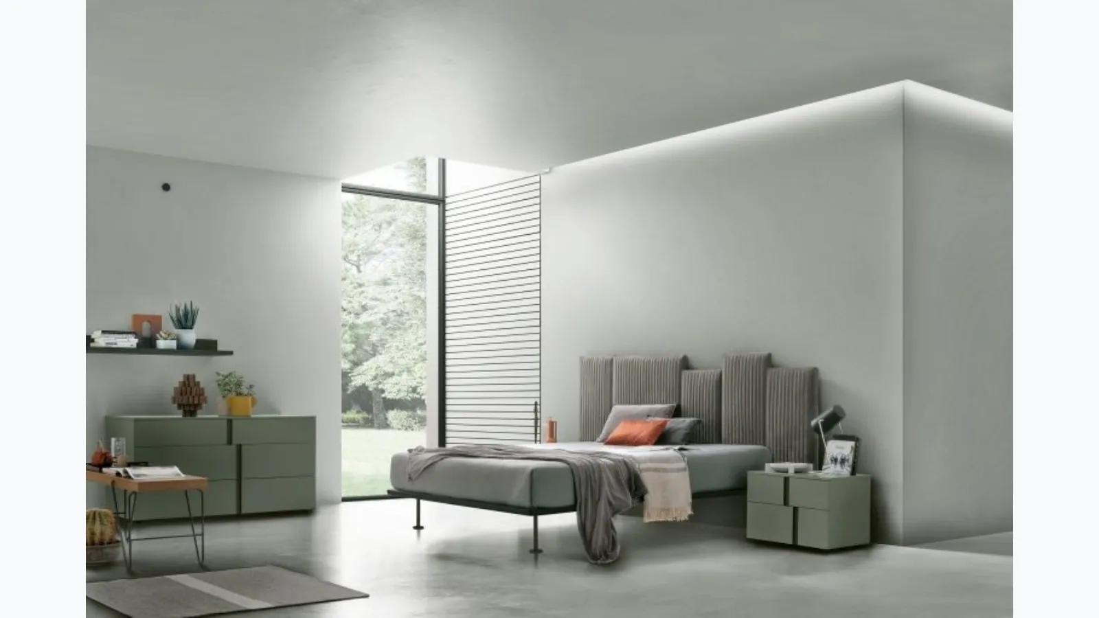 Upholstered bed with Skyline headboard by Tomasella.