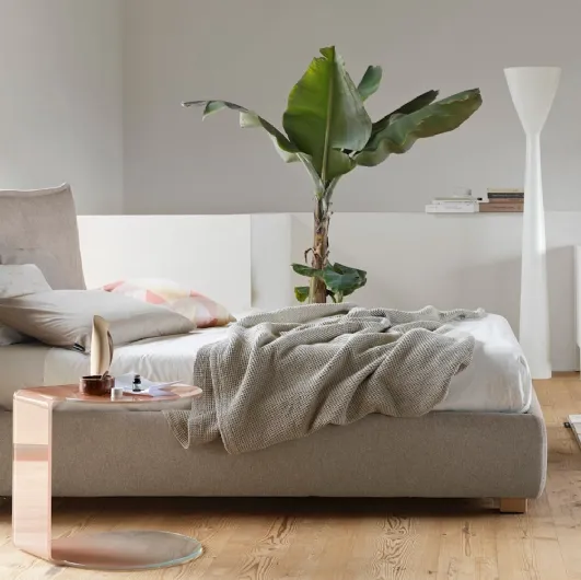 Softly fabric bed with a soft headboard by Calligaris.