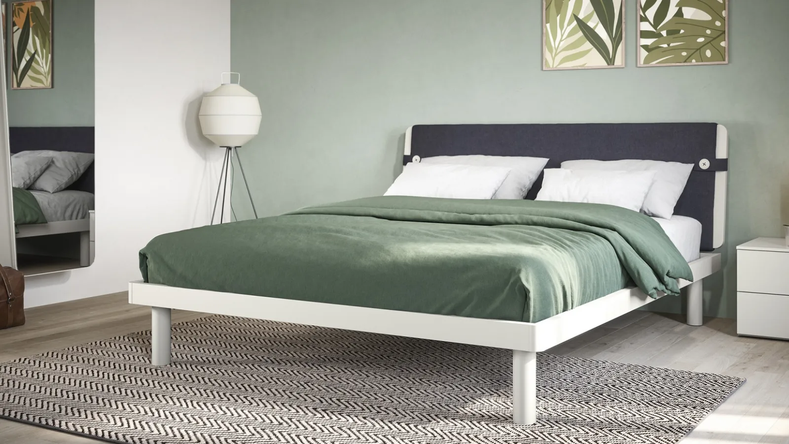 Double bed with headboard covered in Fifty3 Suez fabric.