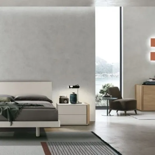 Tomasella's tablet bed in jute material and amber walnut insert is crafted to perfection.