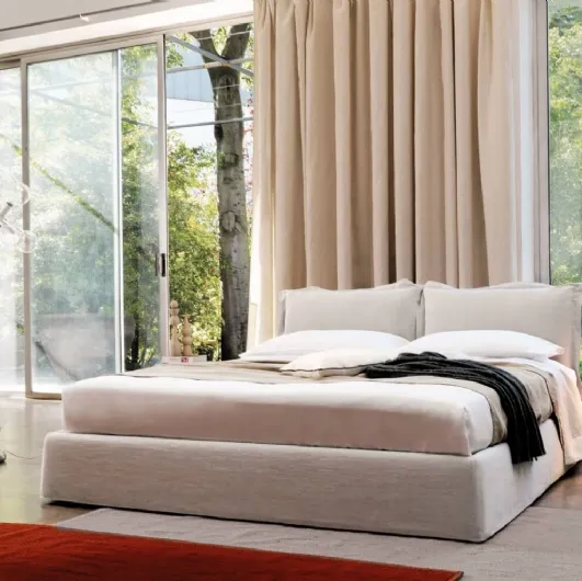 Bed with headboard composed of two soft, upholstered fabric cushions Vanity by Desirèe.