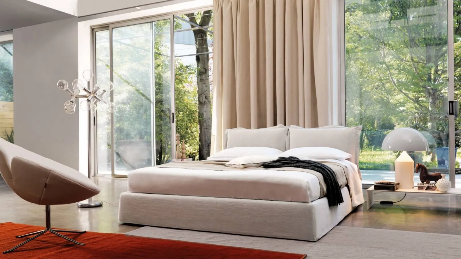 Bed with headboard composed of two soft, upholstered fabric cushions Vanity by Desirèe.