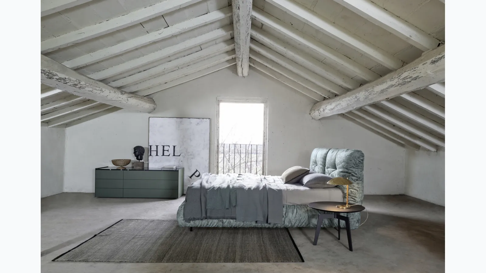 Wave bed with headboard by Flexteam.