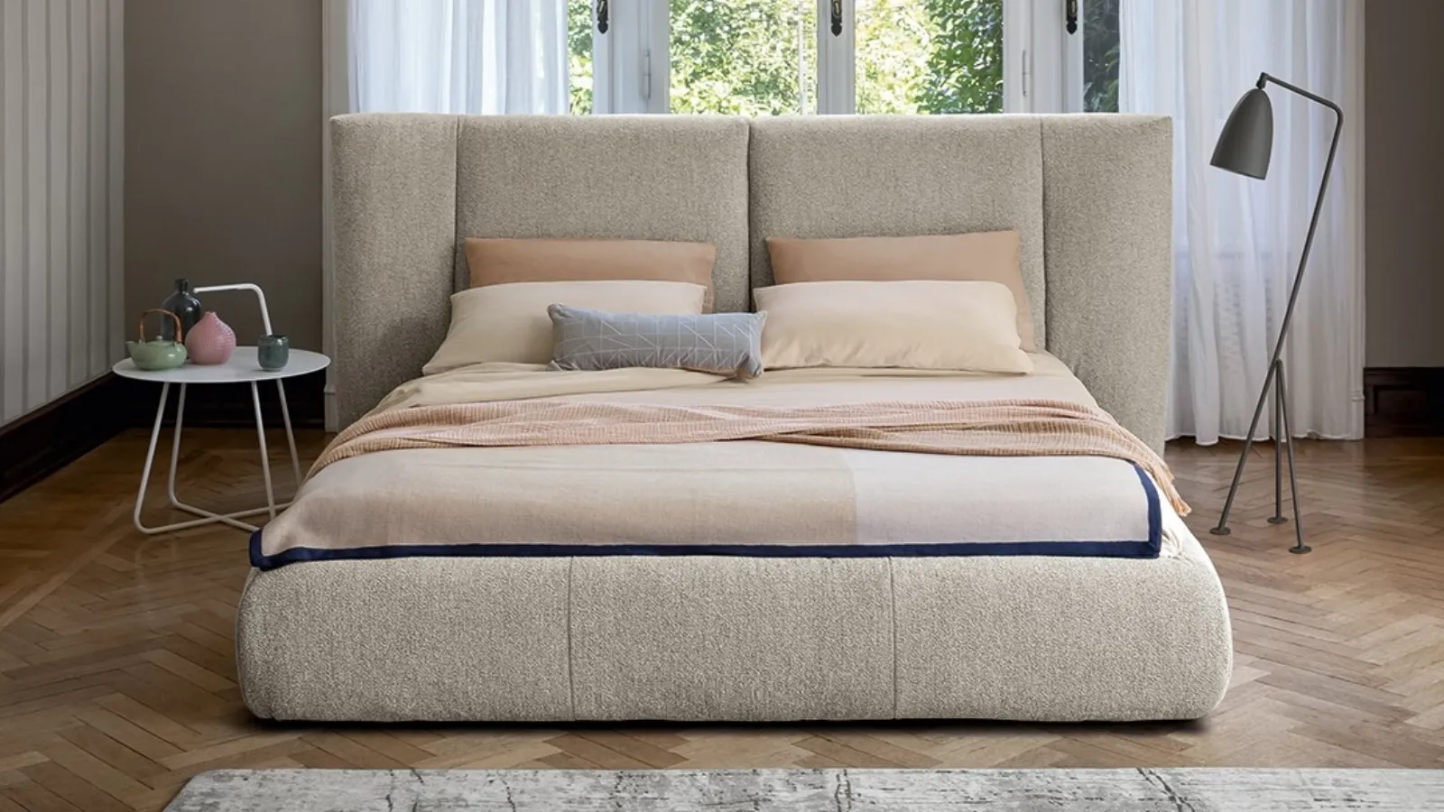 Bed with Youniverse headboard and storage box by Bonaldo