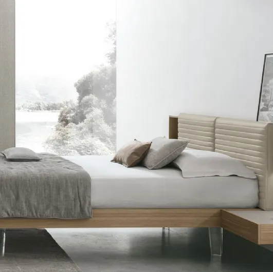 Yuki bed in walnut material with faux leather headboard by Tomasella.