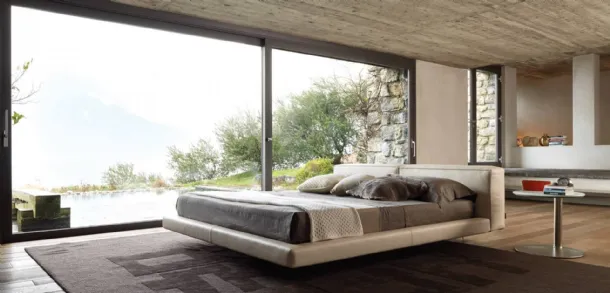 Leather bed with minimalist Zenith headboard design by Desirèe.