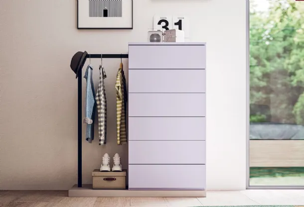 The Ambrogio weekly magazine holder in matte lacquer with integrated coat hanger by Clever.