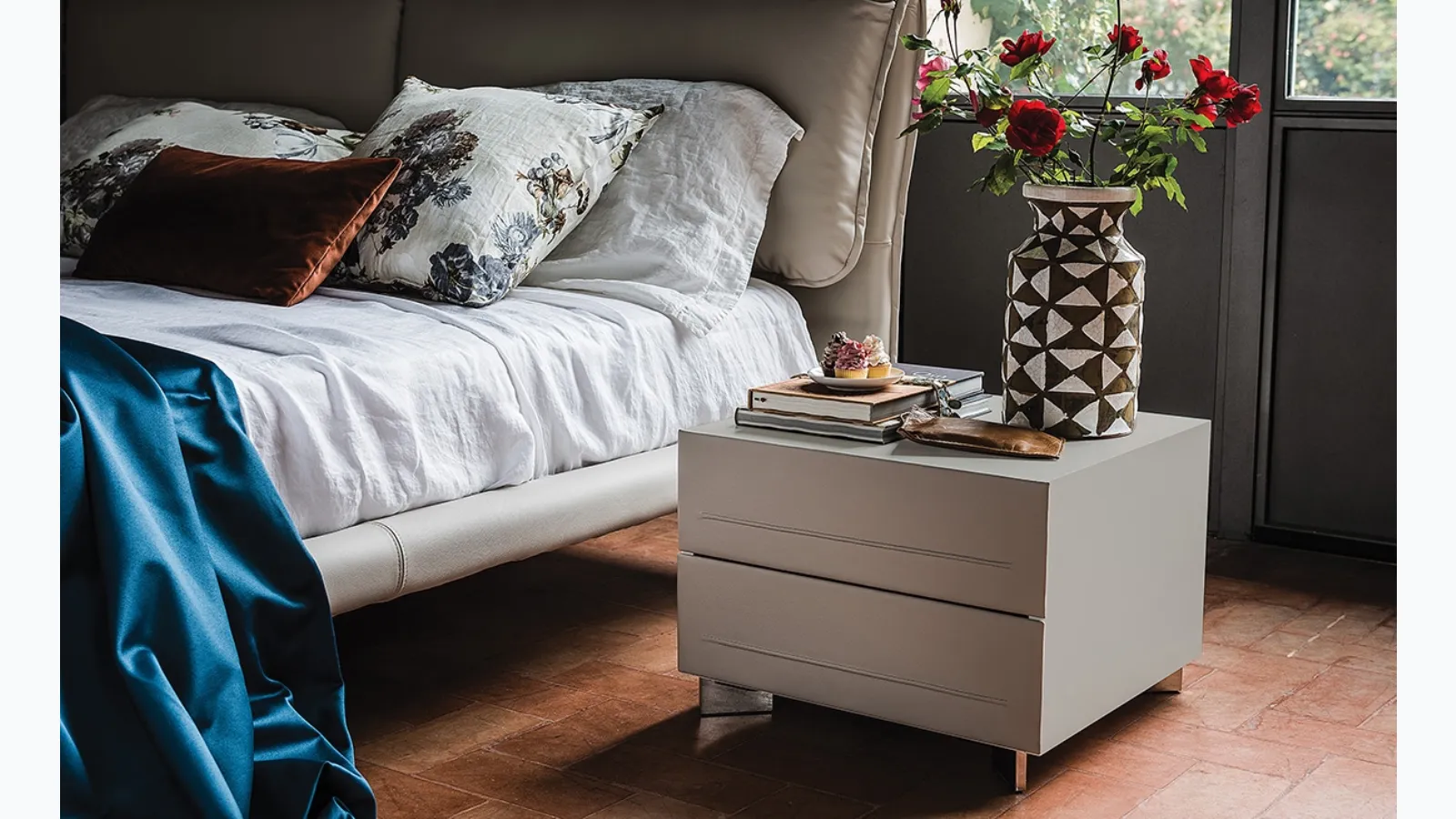 Dyno bedside table in wood covered in leather by Cattelan Italia.