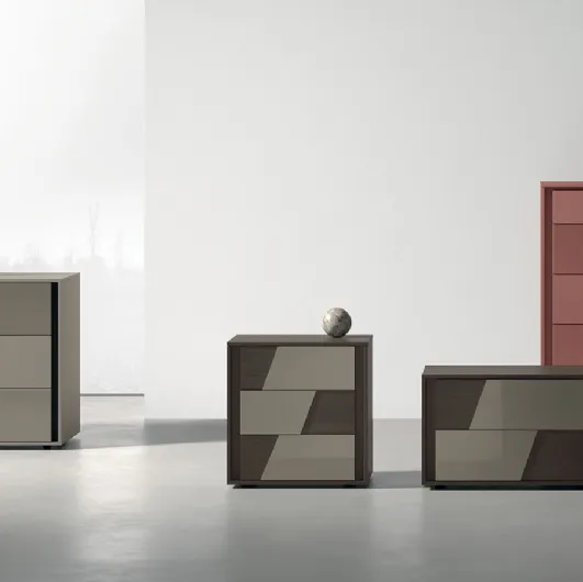 Night Kross group in lacquered or textured finish with glass inserts by Tomasella.