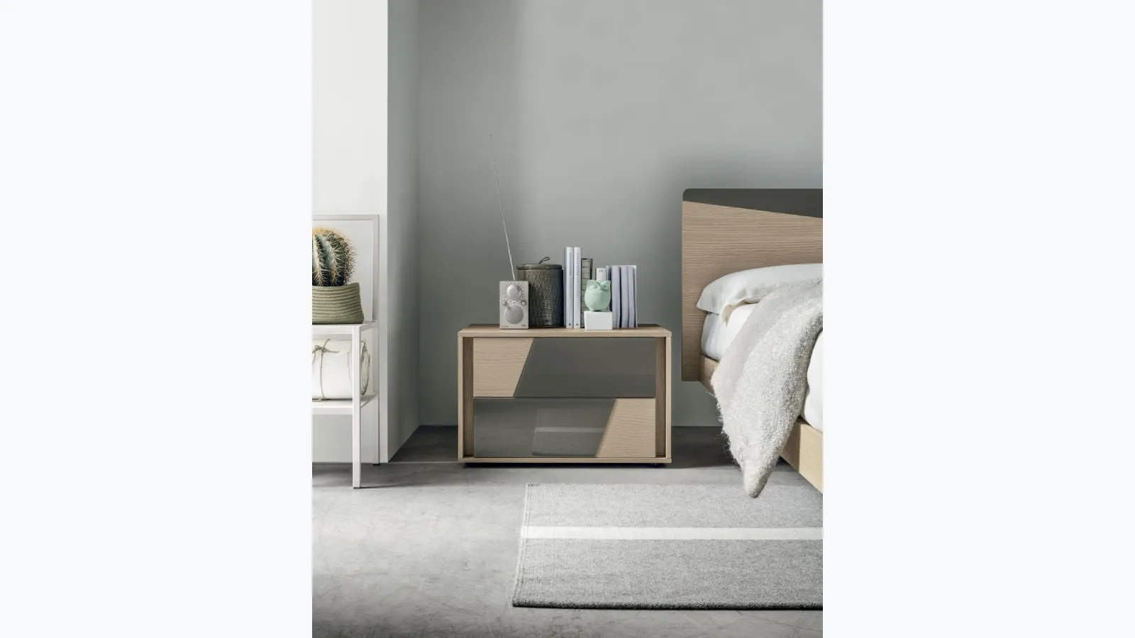 Kross bedside table in material with glass inserts by Tomasella.