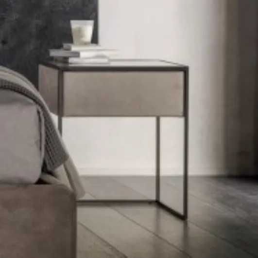 Narcissus bedside table covered in leather with a metal structure by Cantori.