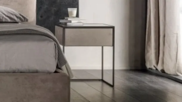 Narcissus bedside table covered in leather with a metal structure by Cantori.