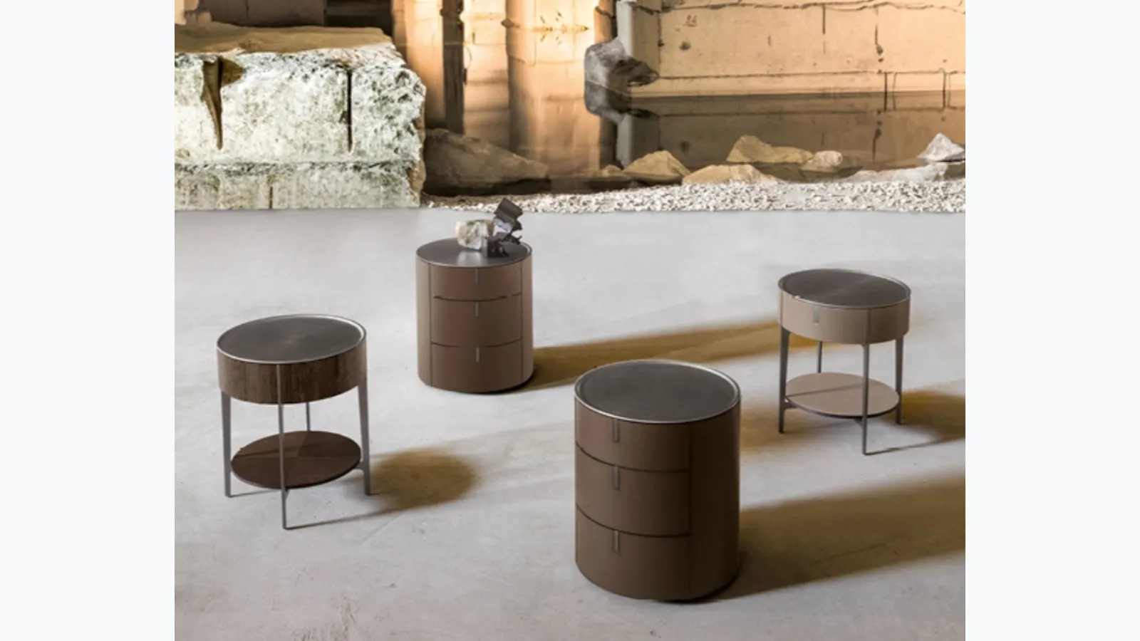 Round bedside table covered in leather with a steel top by Alivardi Alivar.