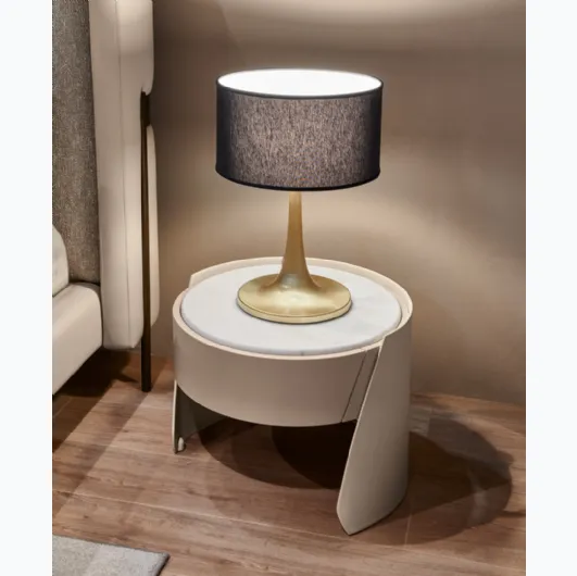 Leather covered bedside table with Sharon marble top by Cantori.