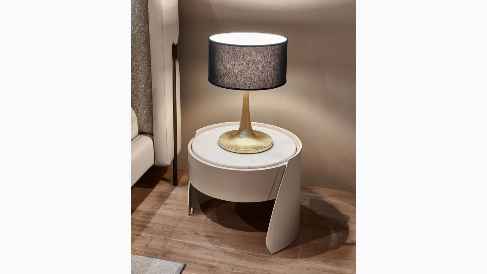 Leather covered bedside table with Sharon marble top by Cantori.