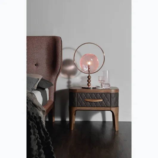 Wooden bedside table with quilted diamond-patterned Tiffany leather covering by Tonin Casa.